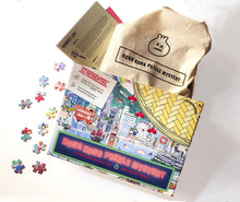 Load image into Gallery viewer, Hong Kong Puzzle Mystery #1: The Dim Sum Steam Off | 500pc Hong Kong Themed Jigsaw Puzzle & Scavenger Hunt Game